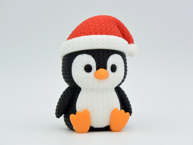 Knitted Penguin with Santa Hat — пінгвін у шапці Санти