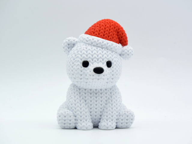 Knitted Polar Bear with Santa Hat — білий ведмідь у шапці Санти