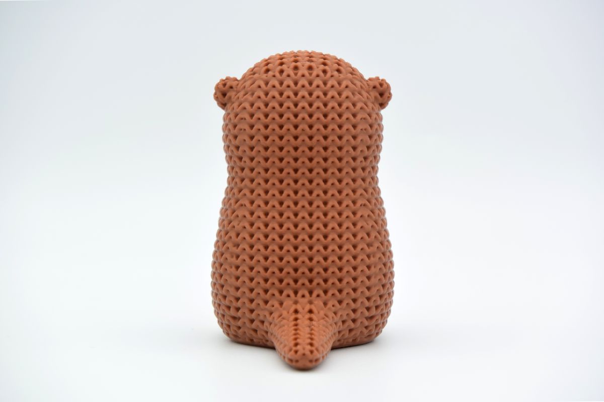 Knitted Otter With Heart — видра із сердечком
