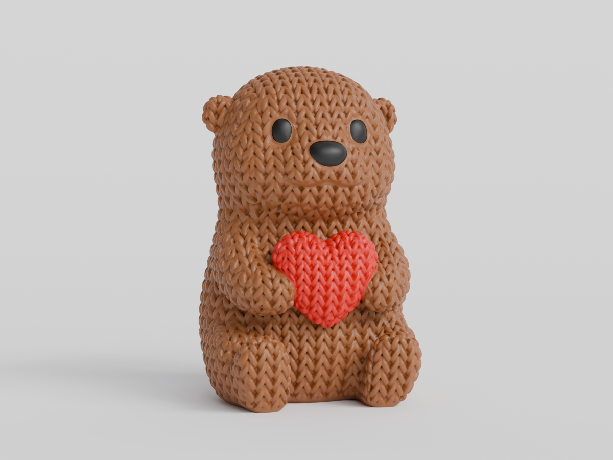 Knitted Otter With Heart — видра із сердечком
