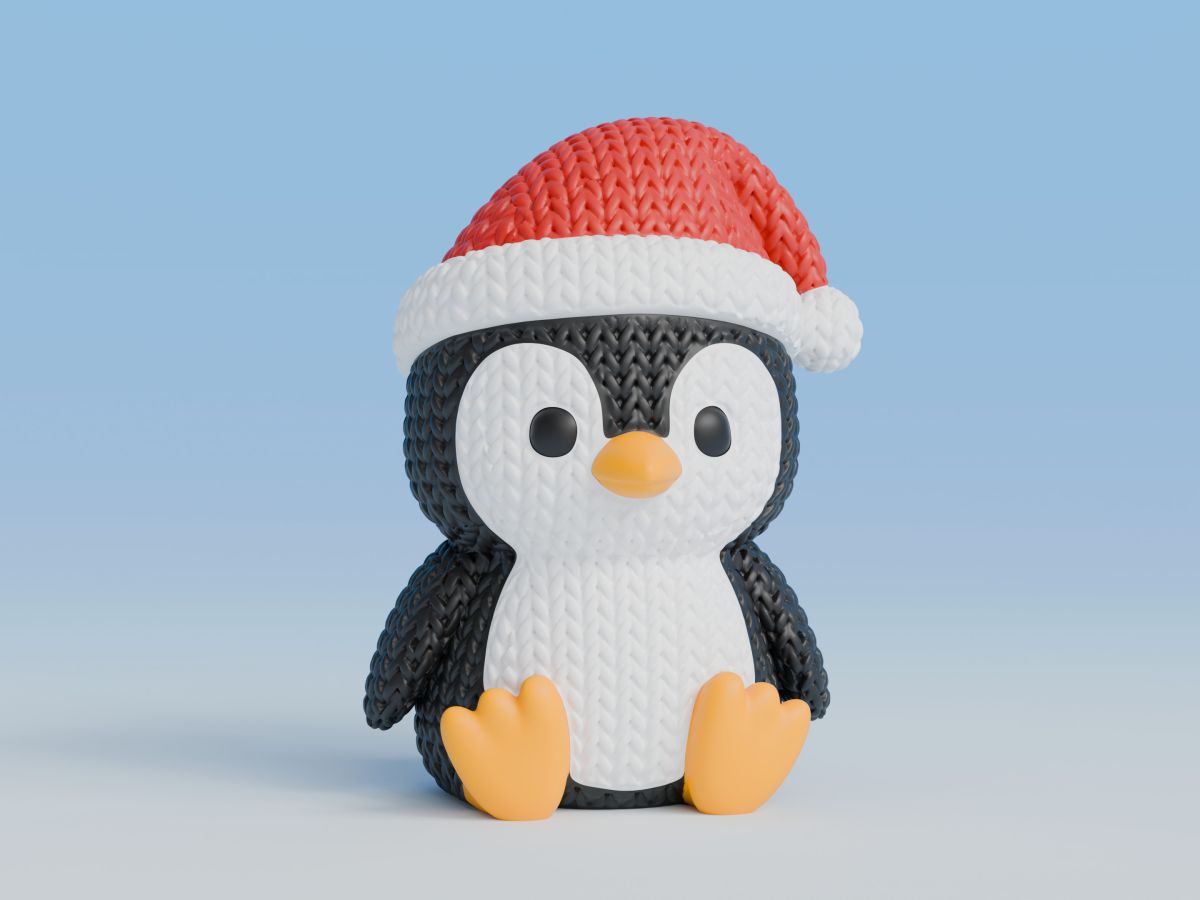 Knitted Penguin with Santa Hat — пінгвін у шапці Санти