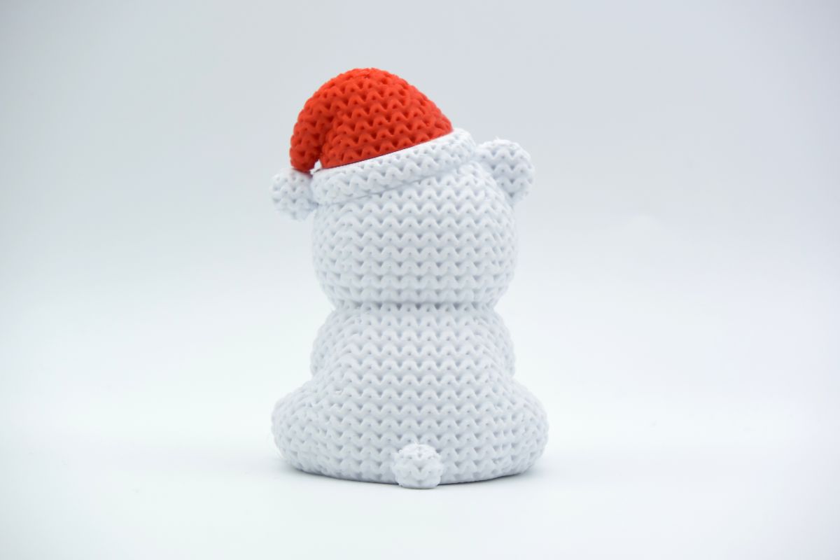 Knitted Polar Bear with Santa Hat — білий ведмідь у шапці Санти